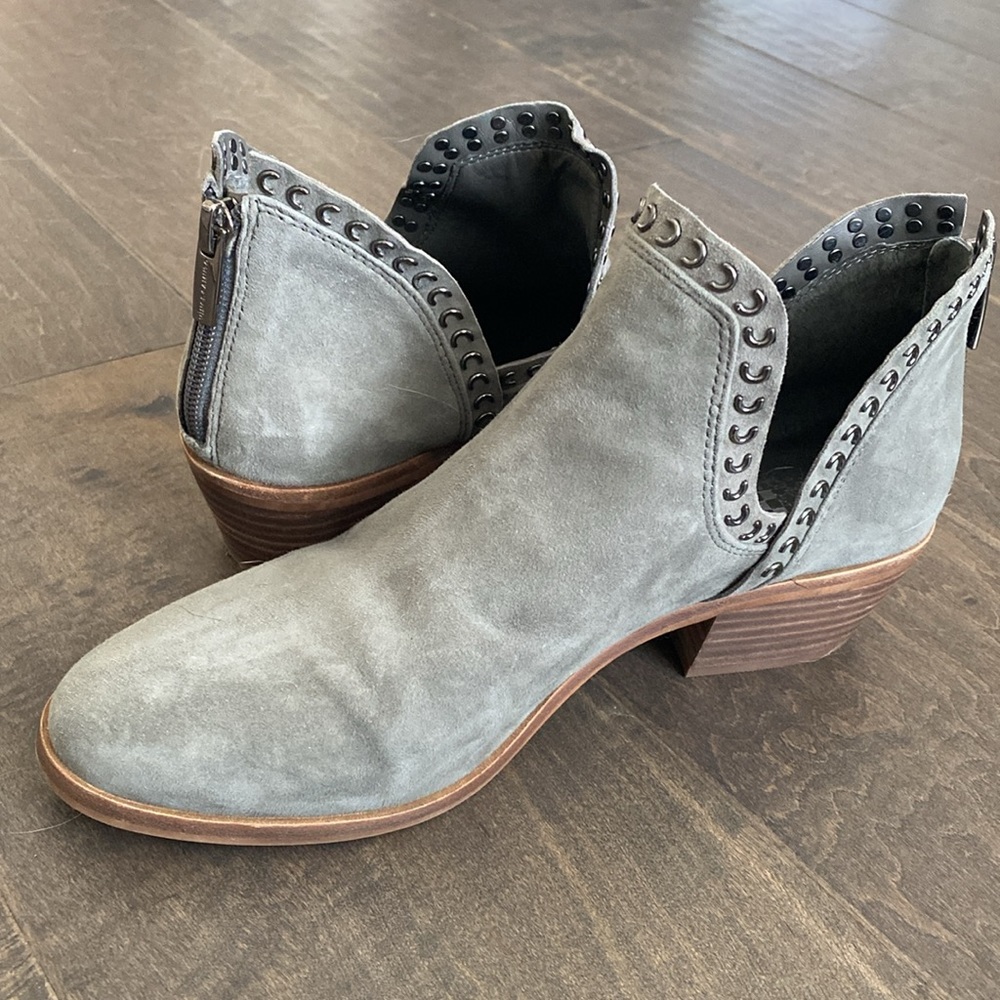 Vince Camuto Gray suede booties with zipper back and metal studded details.